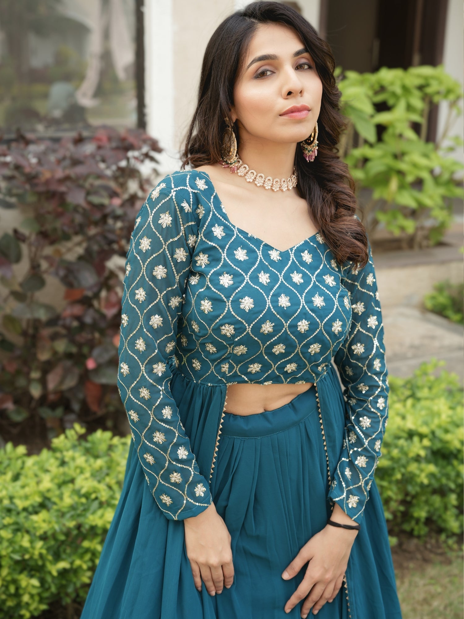 Trending Gorgette Lehenga With Traditional Embroidery Top
