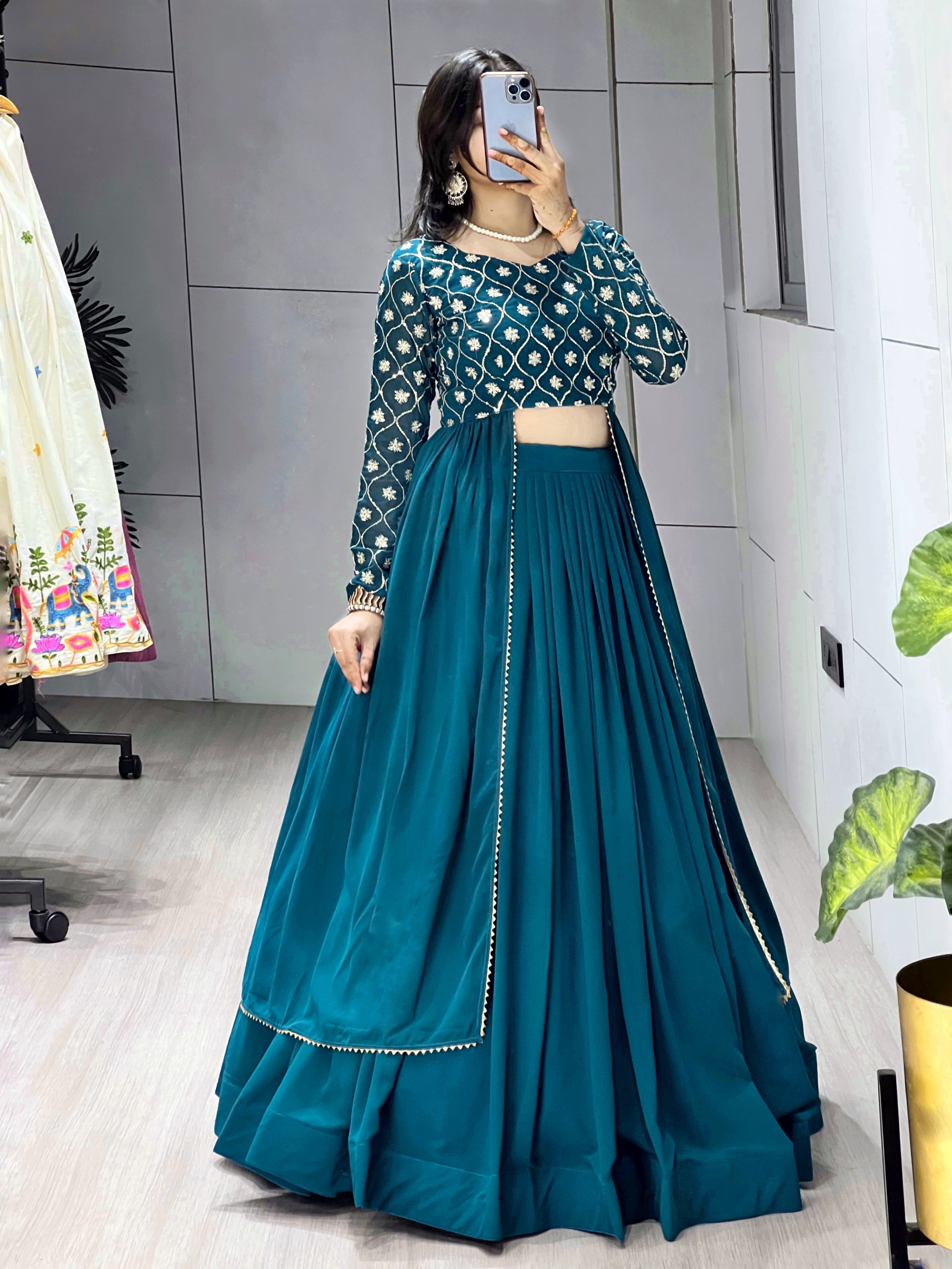 Trending Gorgette Lehenga With Traditional Embroidery Top