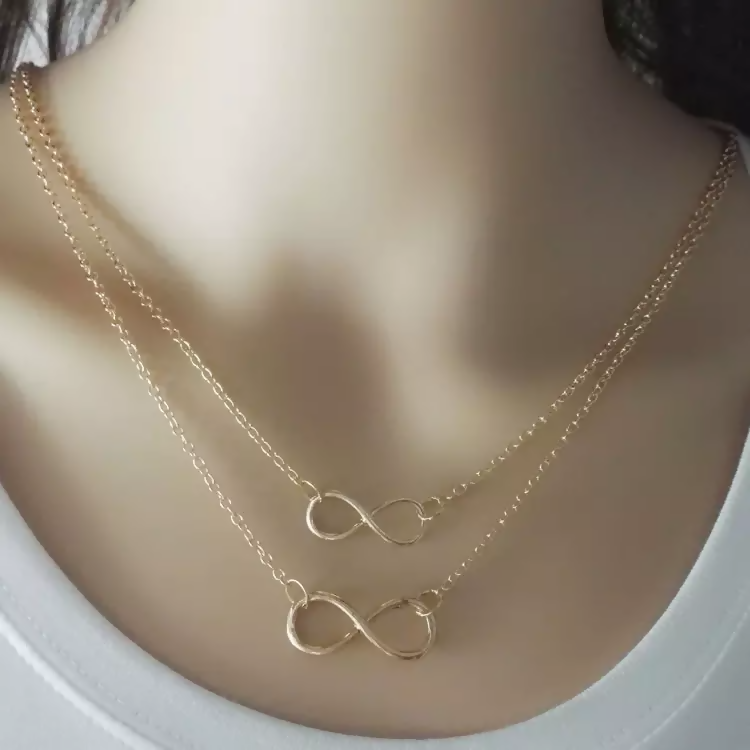 Faith & Protection: Infinity Cross & Hamza Gold Necklace Set of 3 pinapes