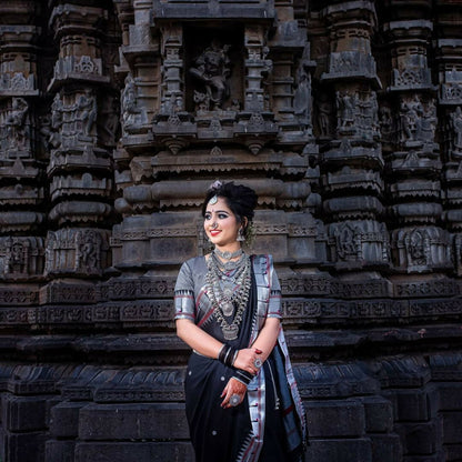 AXONIT Cultural Classic Black Cotton Saree with Elegant Silver Zari Work and Festive Red Border