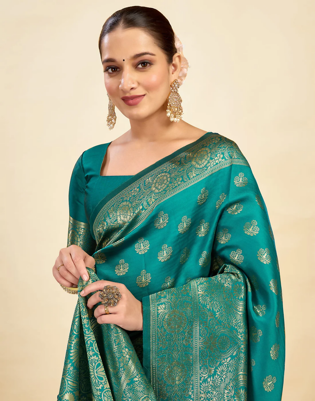 Royal Emerald Jacquard Saree with Golden Zari Work & Heavy Brocade Border