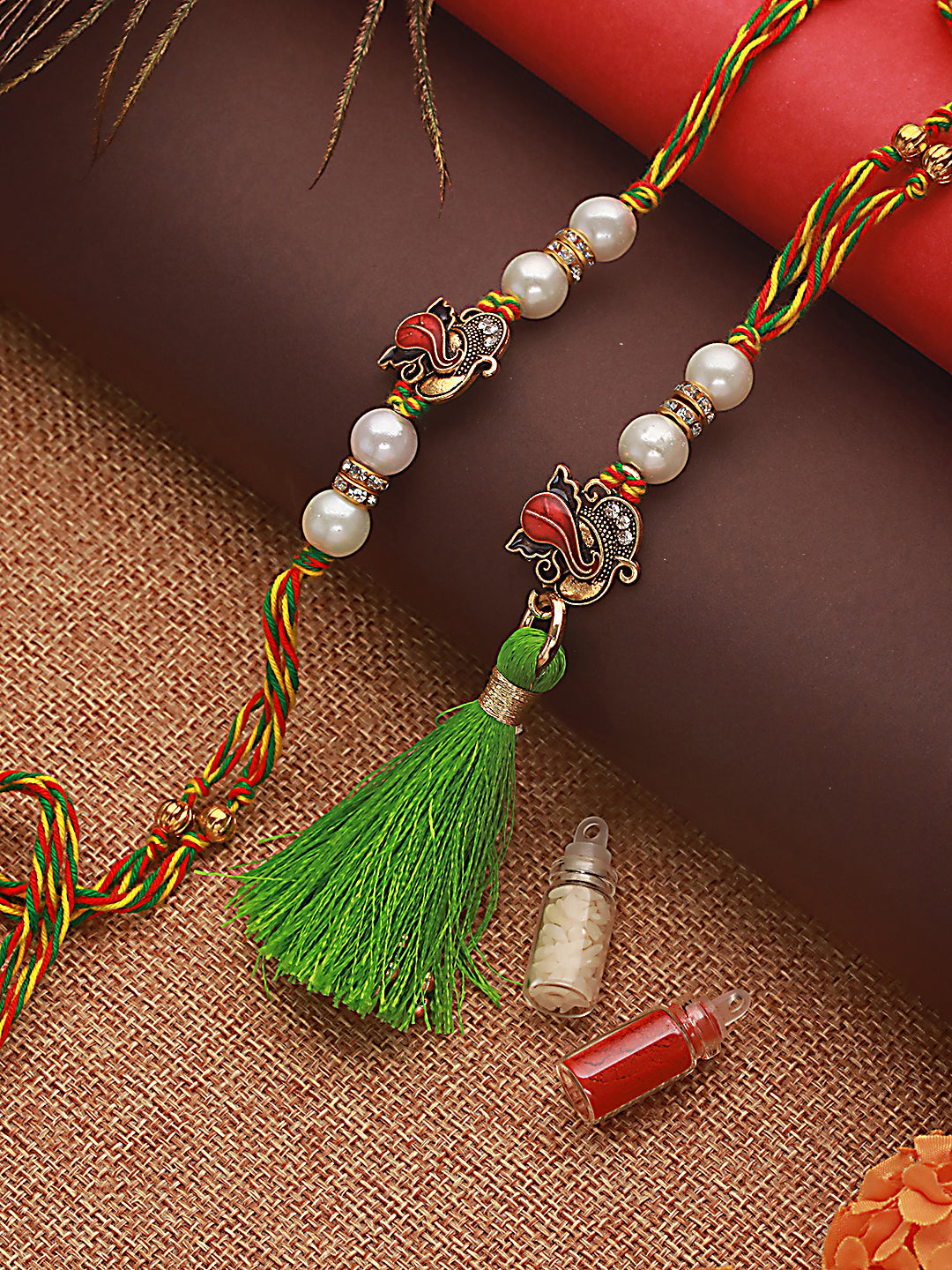 Jazz And Sizzle Set Of 2 Ganesh Bhaiya Bhabhi Tasseled Rakhi With Roli & Chawal