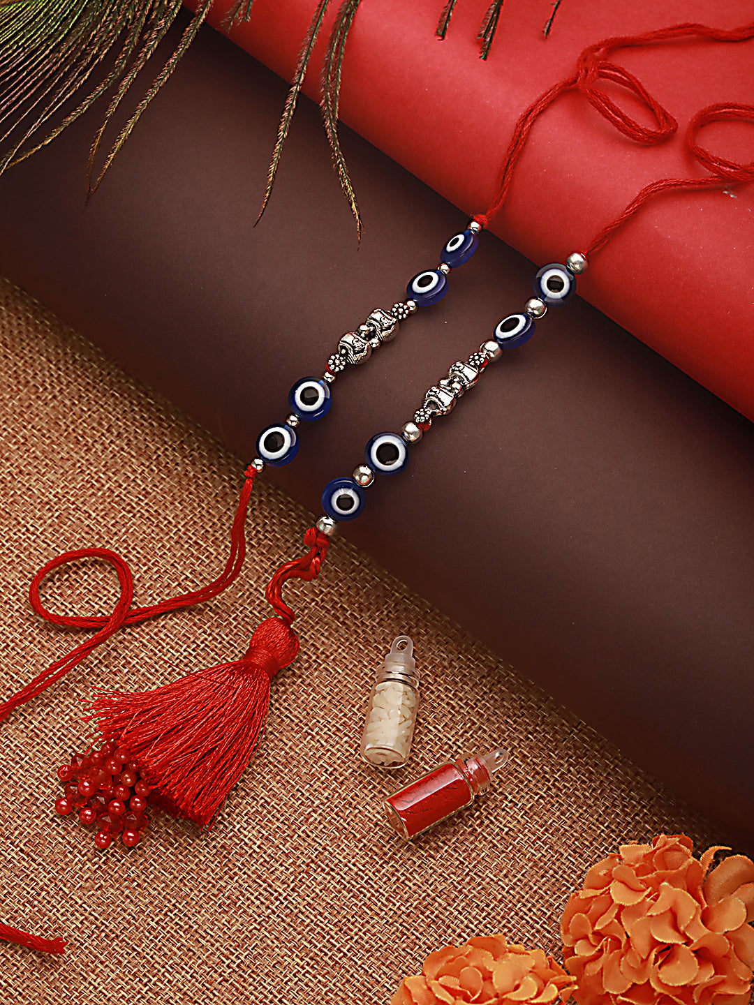 Jazz And Sizzle Set Of 2 Evil Eye Bhaiya Bhabhi Tasseled Rakhi With Roli & Chawal