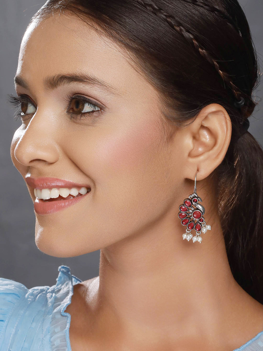 Silver-Plated Red Stone Studded & Pearl Beaded Peacock Shaped Drop Earrings