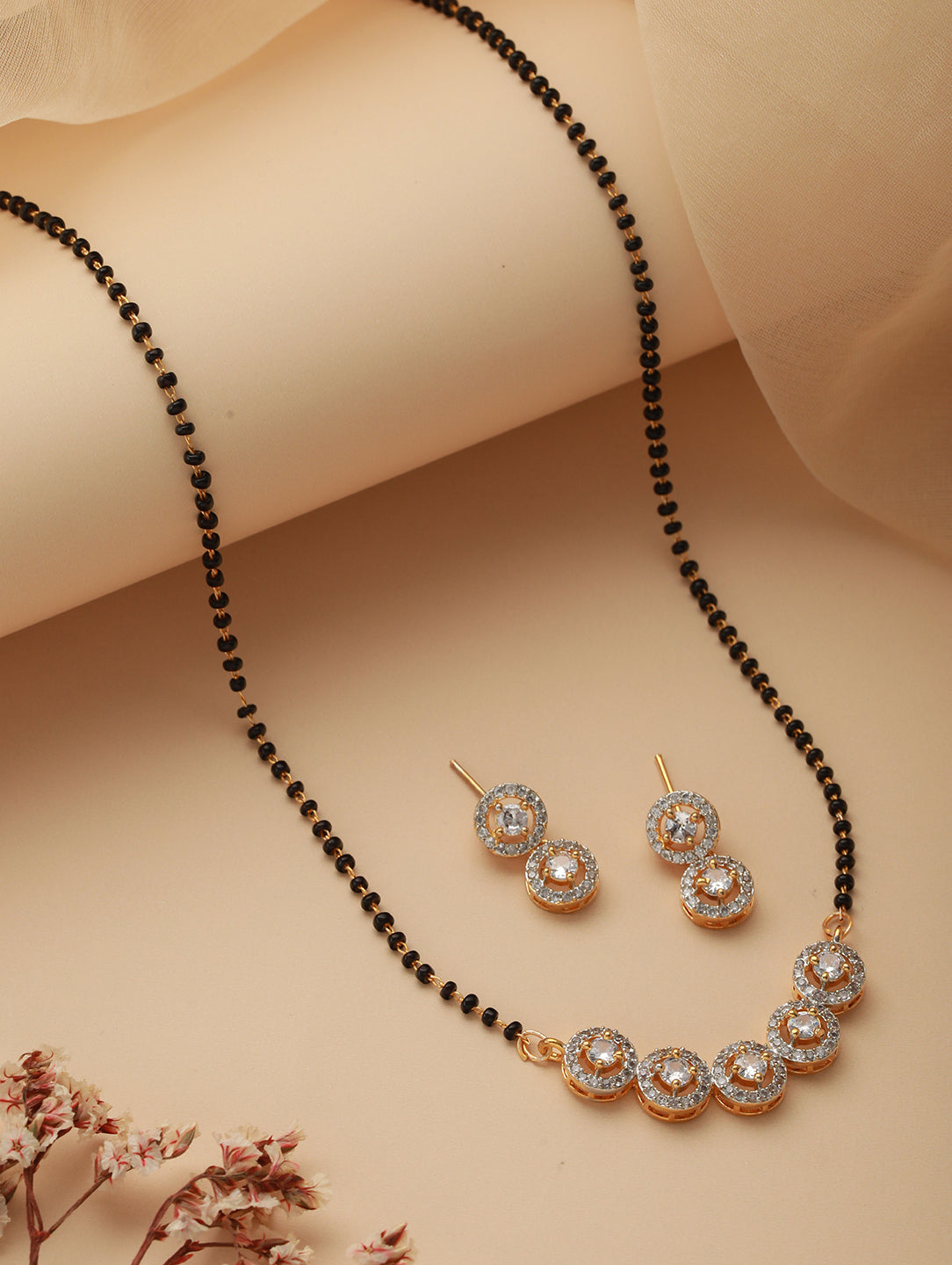 Jazz And Sizzle Gold-Plated Black Beaded & American Diamond-Studded Mangalsutra With Earrings