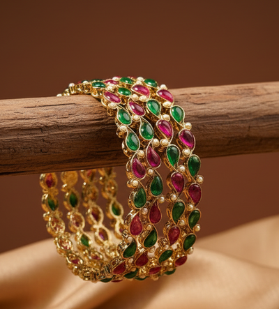 Aatmana By J&S 4 Gold Plated Artificial Stone Studded & Pearl Beaded Bangles