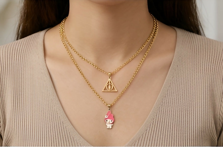 Elegant Gold Pendant Necklace Set – Triangle Symbol & Cute Character Charm (Set of 2)