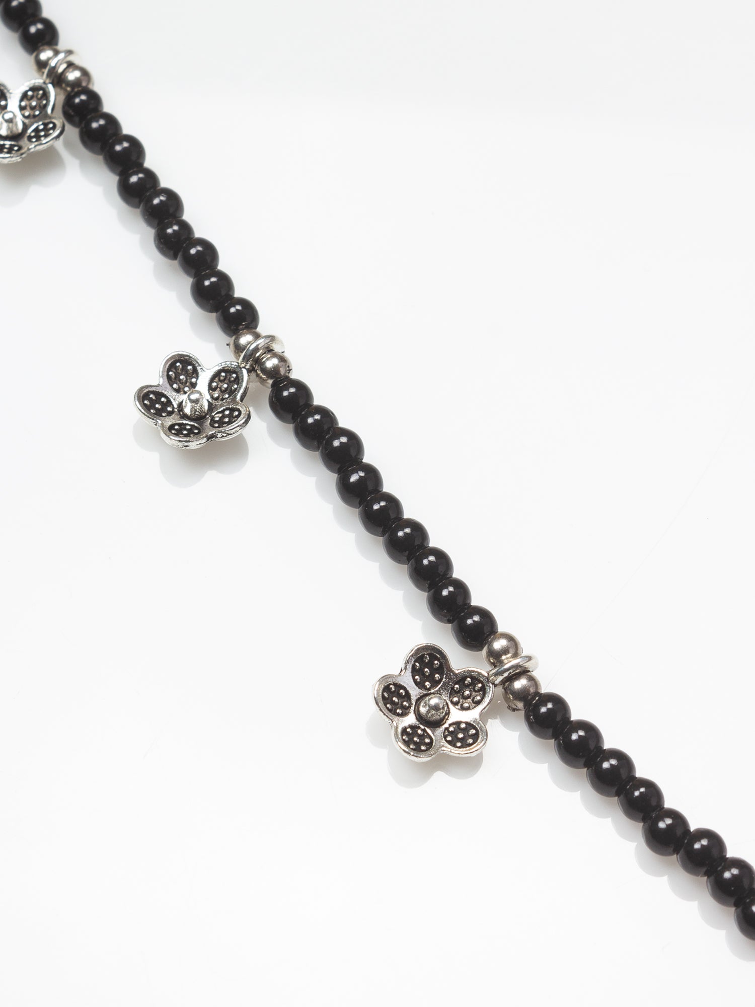 Black Beaded Oxidized Silver Floral Charm Anklet – View 2 | Aadita Jewelry