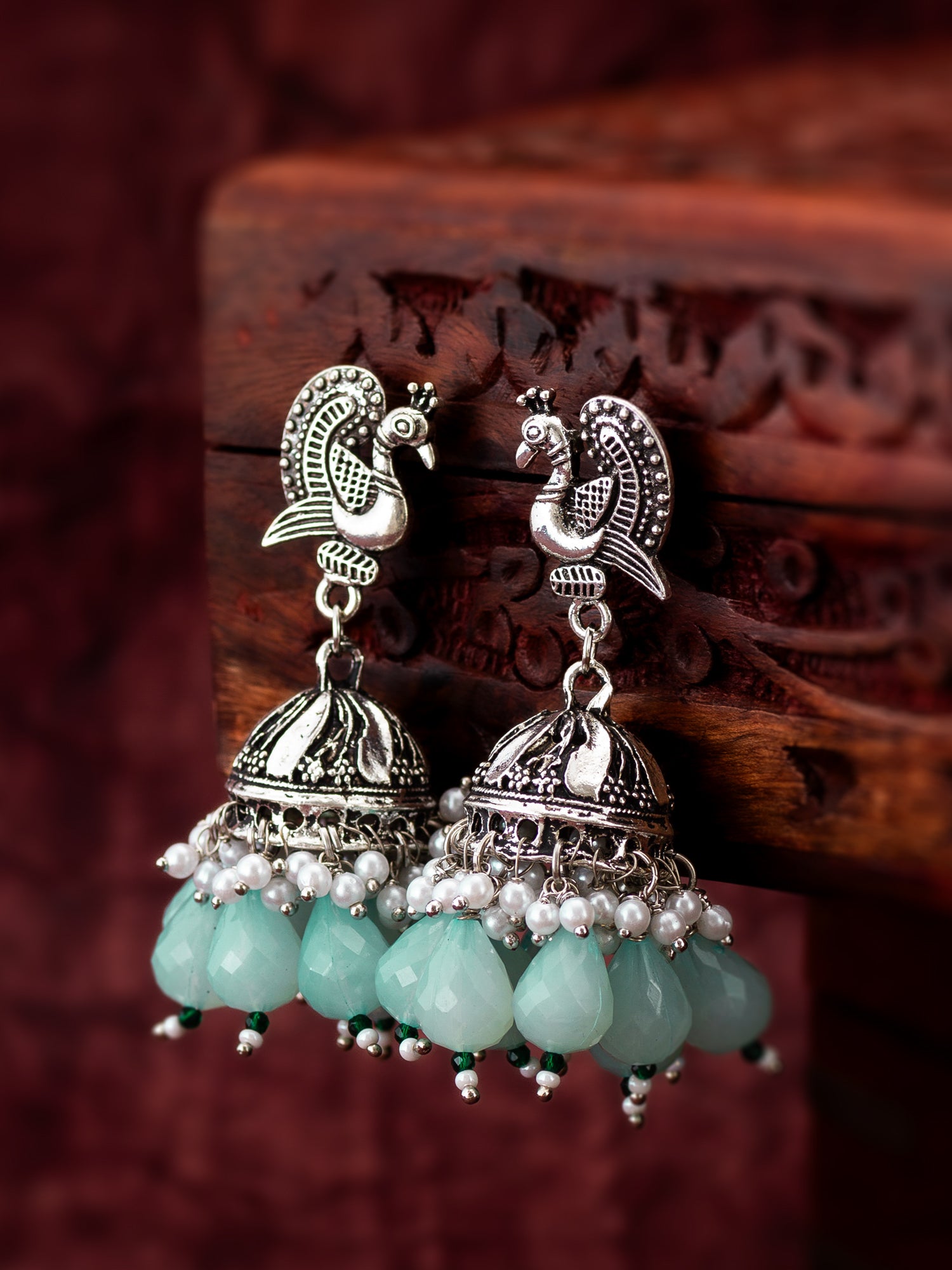 Oxidized Silver Peacock Jhumka Earrings with Mint Green Beads and Pearl – View 4 | Aadita Jewelry