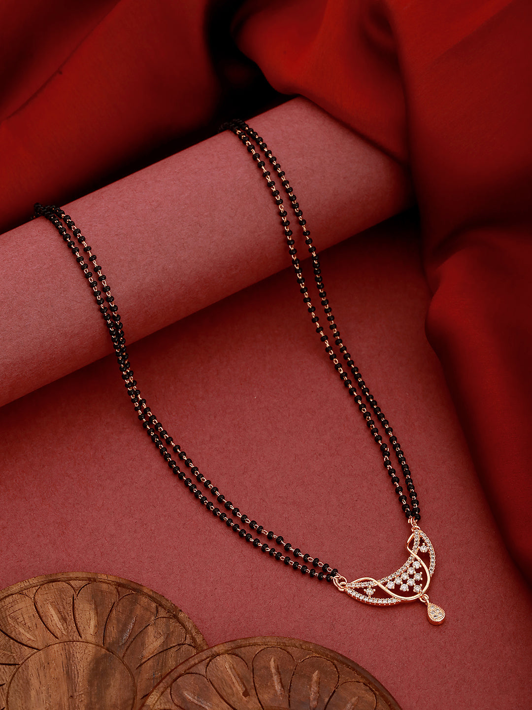 Gold-Plated Black Beaded & White Ad Stone-Studded Floral Shaped Mangalsutra