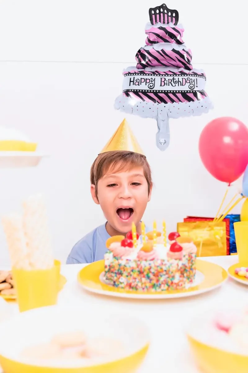 1735800517540__1735800517132__portrait-boy-blowing-candle-birthday-celebration_23-21480462242
