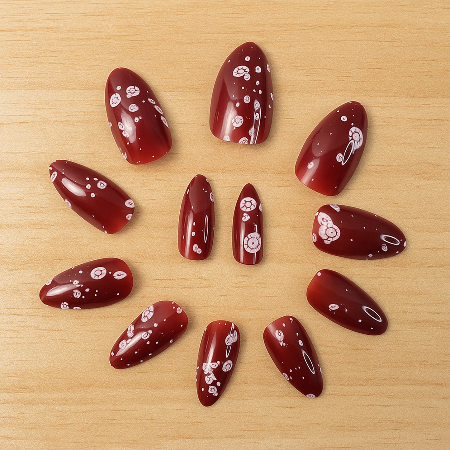 Premium Burgundy Artificial Nail Set with White Floral Art Design – 12 Pieces(Mix Design  1 Set)