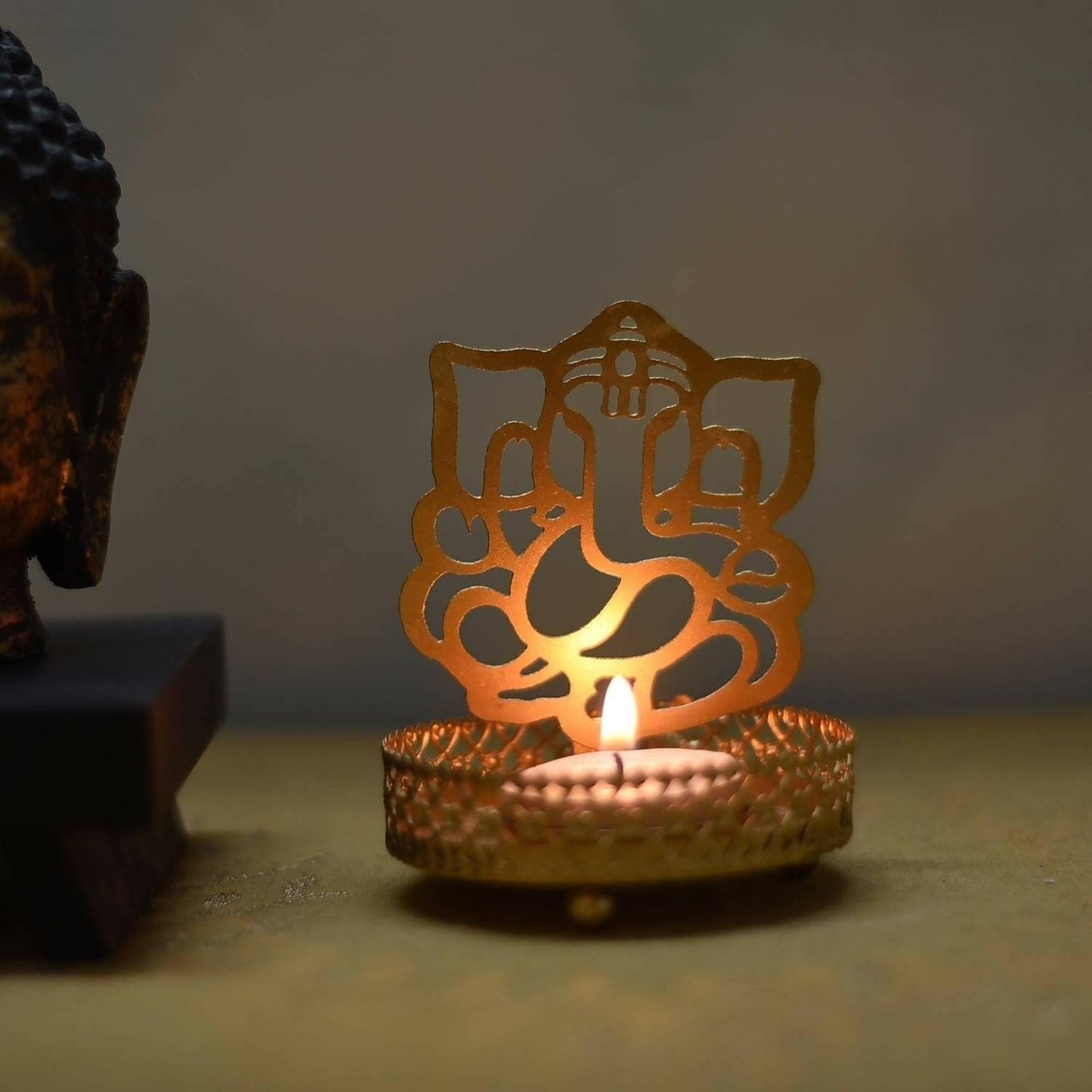 UDHWANI by Kakkumal Govindram Lord Ganesha Shadow Tea Light Holder Ganesha Candle holder (Pack of 1) - HalfPe