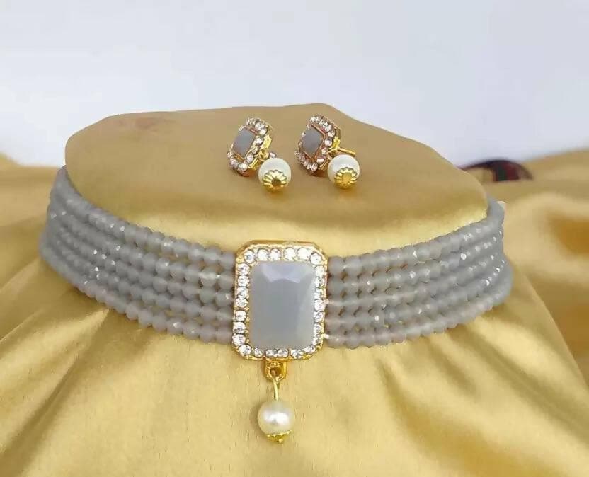 Alloy gold plated white jewel set with large blue stone | MANATH - HalfPe