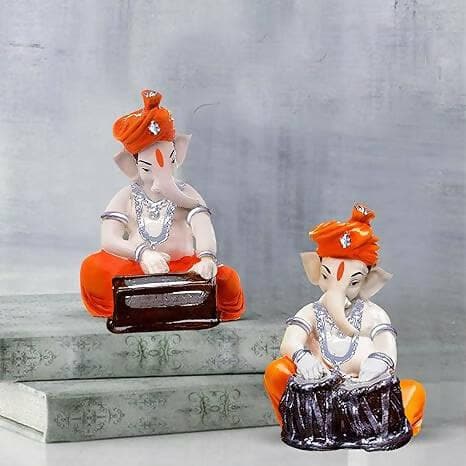 ARTISANS ALLEY Sitting Ganesha with Musical Instrumnents Decorative Statue for Home Decor - (Pack of 2, White & Orange) - HalfPe