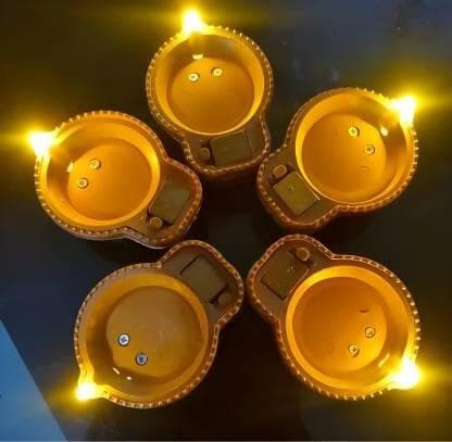 UDHWANI by Kakkumal Govindram Candles LED Diya with Water Sensor Battery Powered For Temple Office/Home Decoration (Pack of 12) - HalfPe