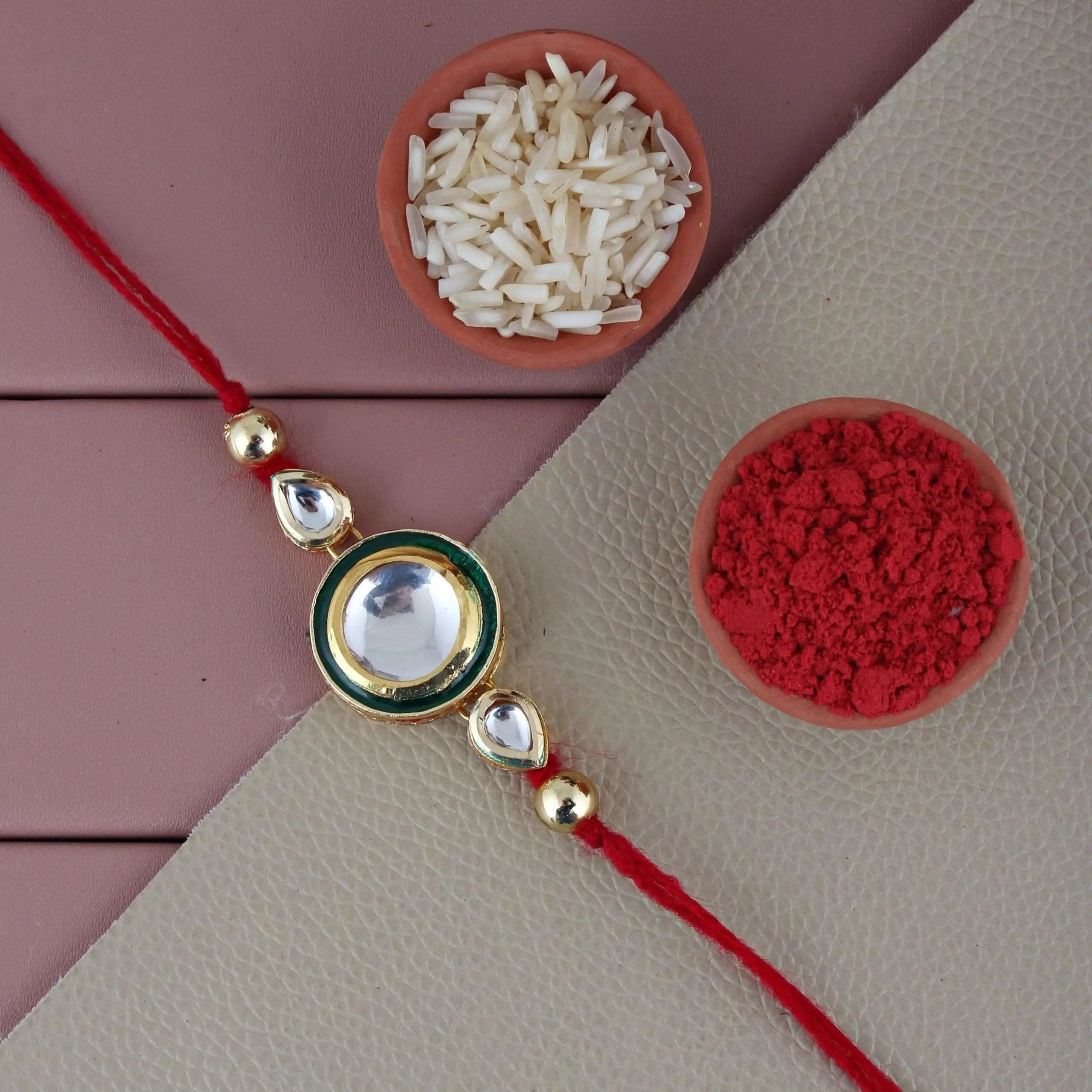 Designer Gold-Plated ferozi color meena thread rakhi with green outer ring | LUCKY JEWELLERY - halfpeapp