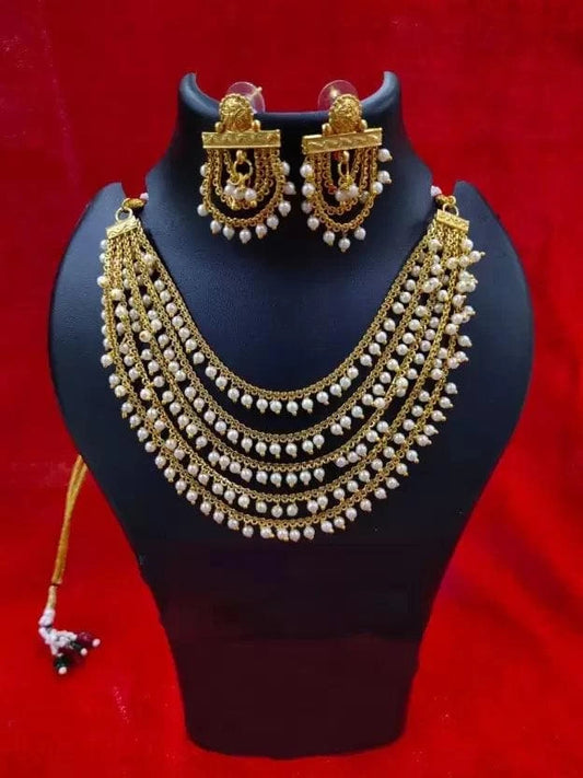 Gold plated chain with white stone hangings | MANATH - halfpeapp